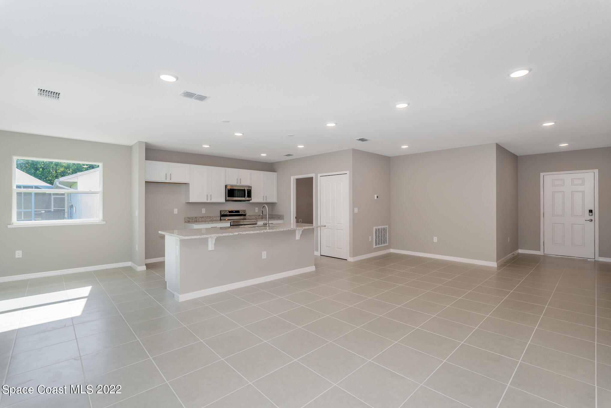 660 Sauders Road Southeast Palm Bay, FL 32909 - Photo 4 of 23 Great Room2
