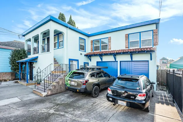 a car parked in front of a house