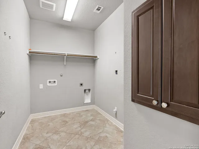 a view of a room with rack on the wall