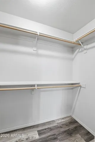 a view of an empty walk in closet