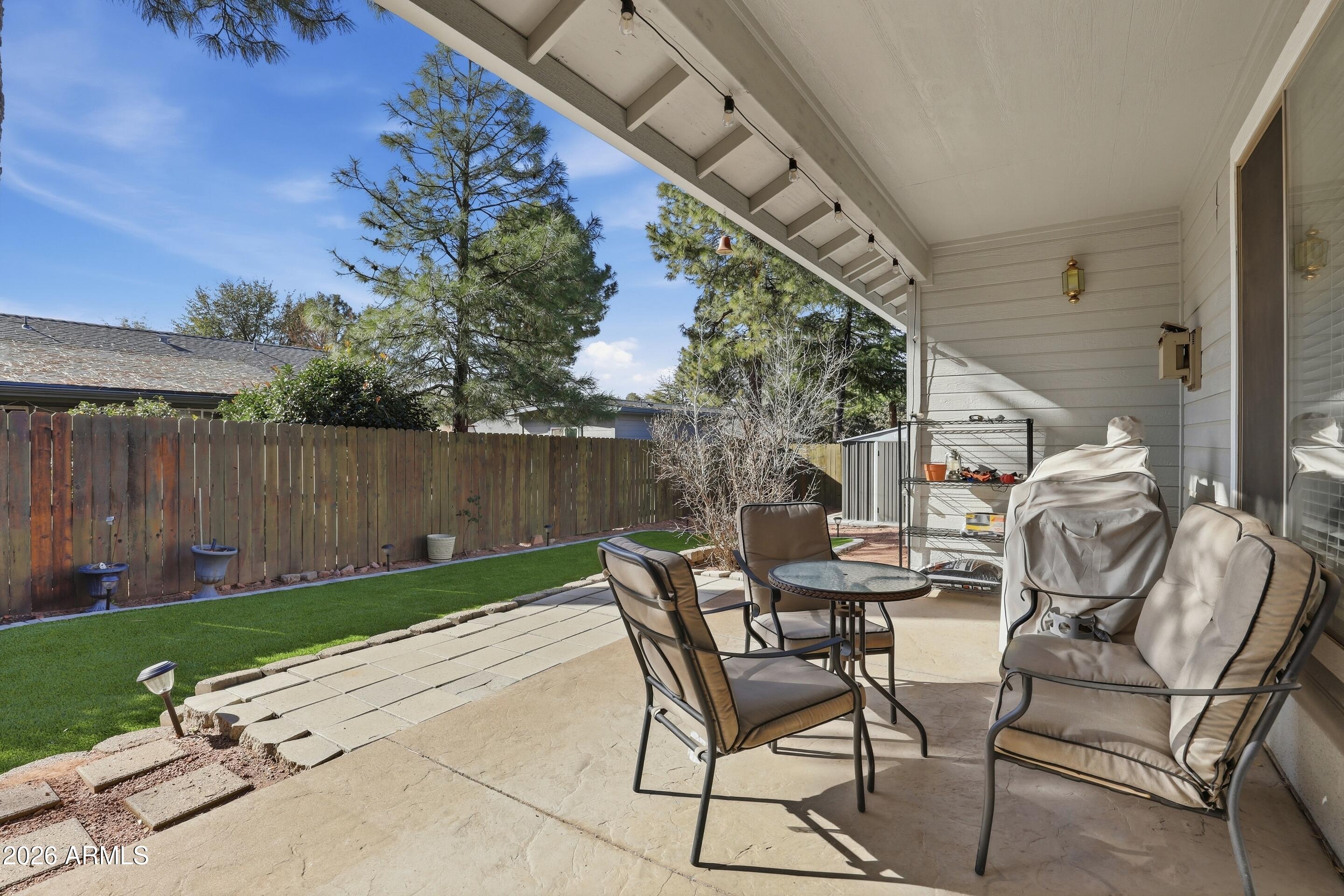 913 Landmark Trail Payson, AZ 85541 - Photo 26 of 47 a view of backyard with outdoor seating and green space