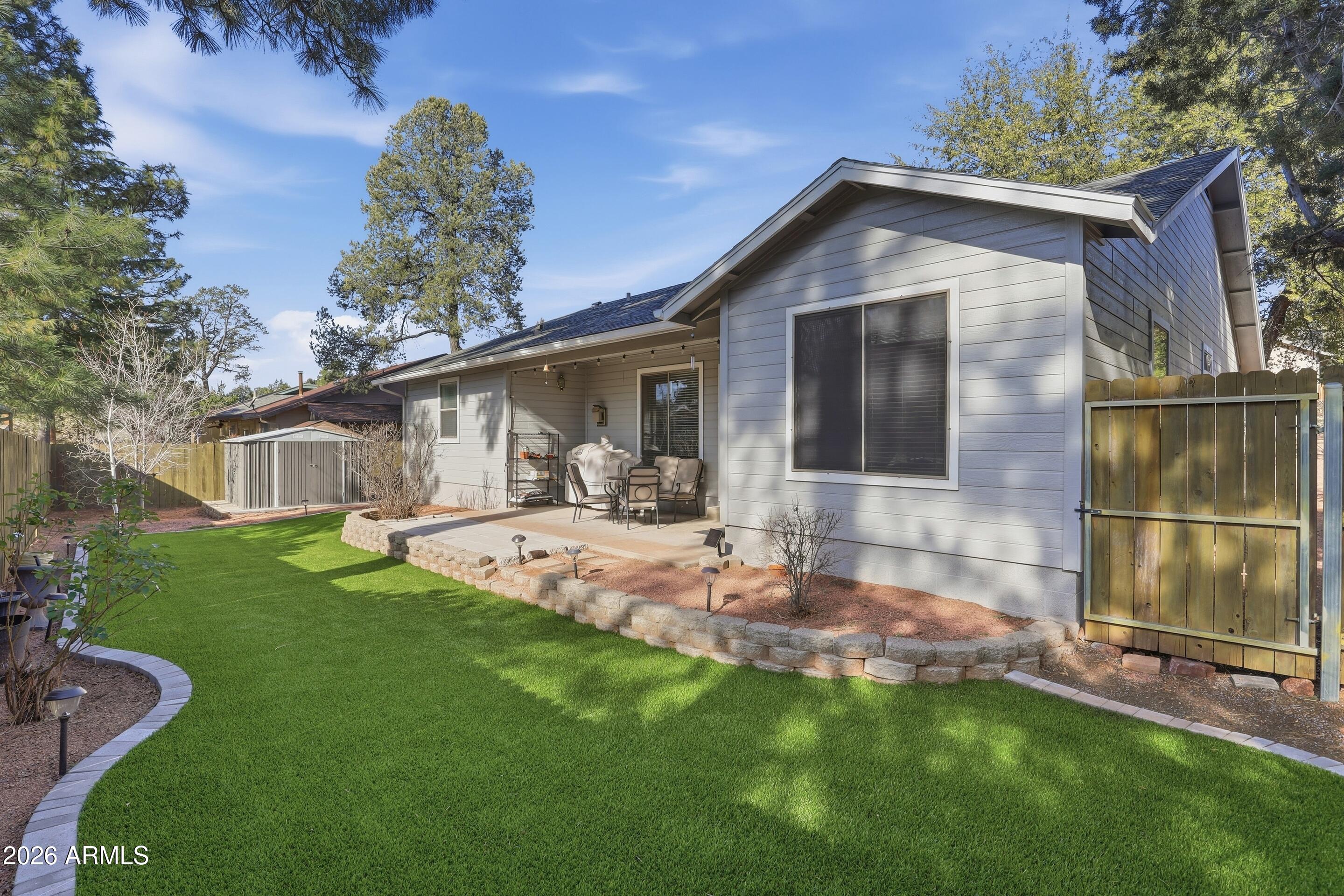 913 Landmark Trail Payson, AZ 85541 - Photo 29 of 47 a front view of a house with a yard