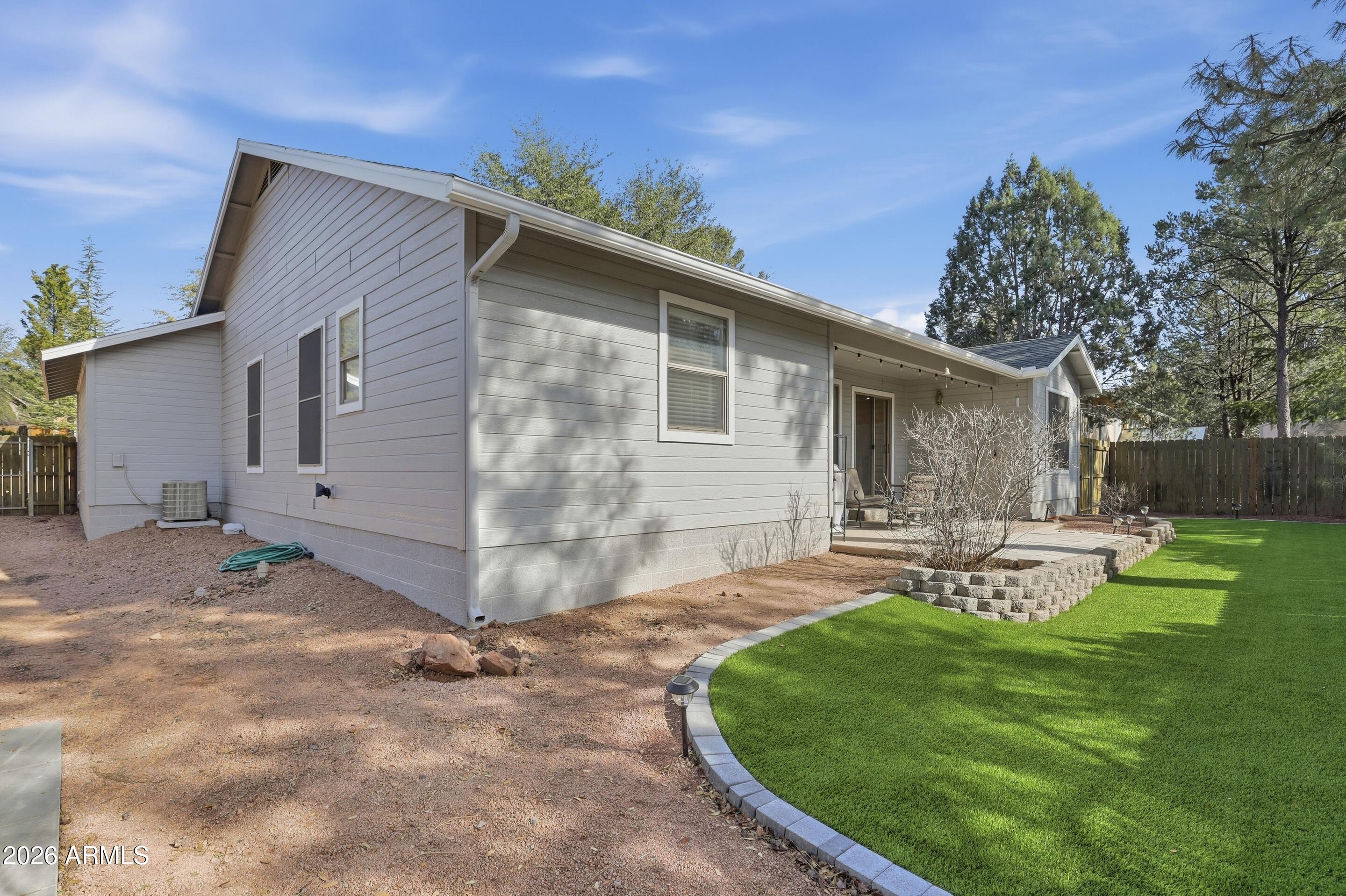 913 Landmark Trail Payson, AZ 85541 - Photo 30 of 47 a view of a house with backyard and sitting area
