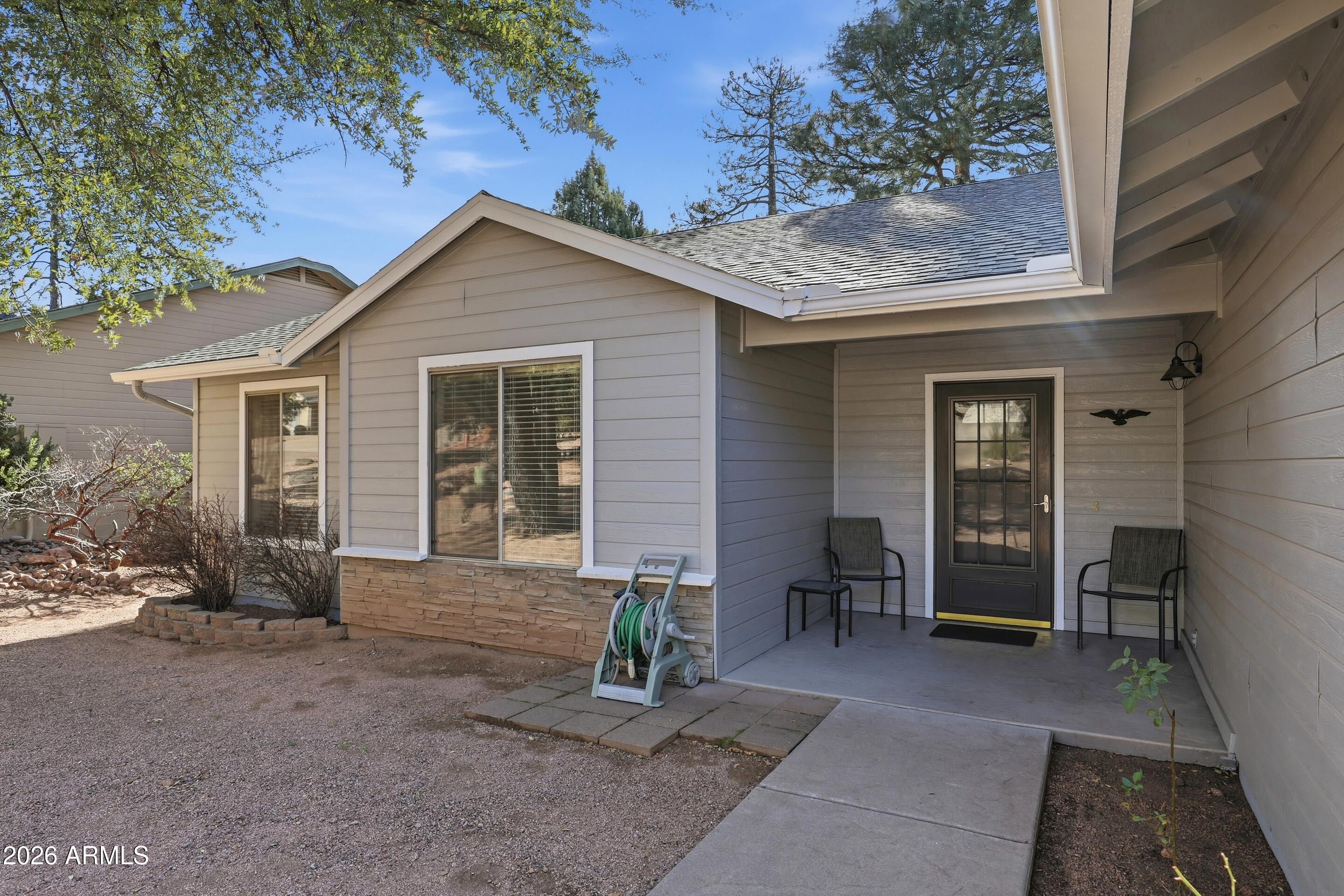 913 Landmark Trail Payson, AZ 85541 - Photo 36 of 47 a front view of a house with garden