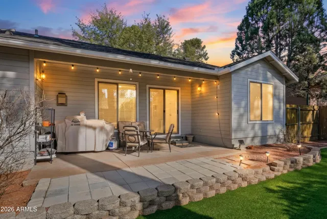 a front view of a house with a outdoor seating