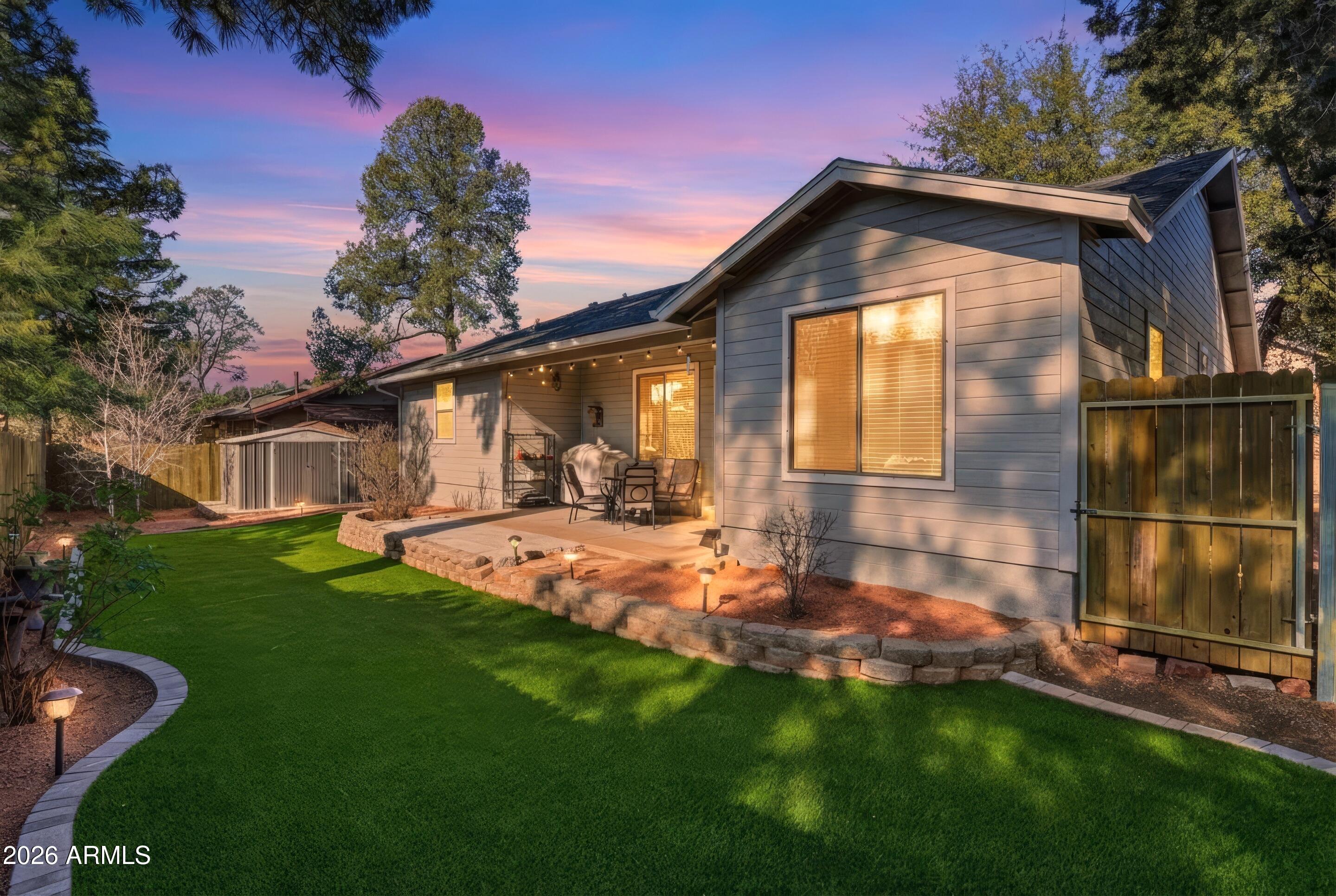 913 Landmark Trail Payson, AZ 85541 - Photo 47 of 47 a front view of a house with a yard
