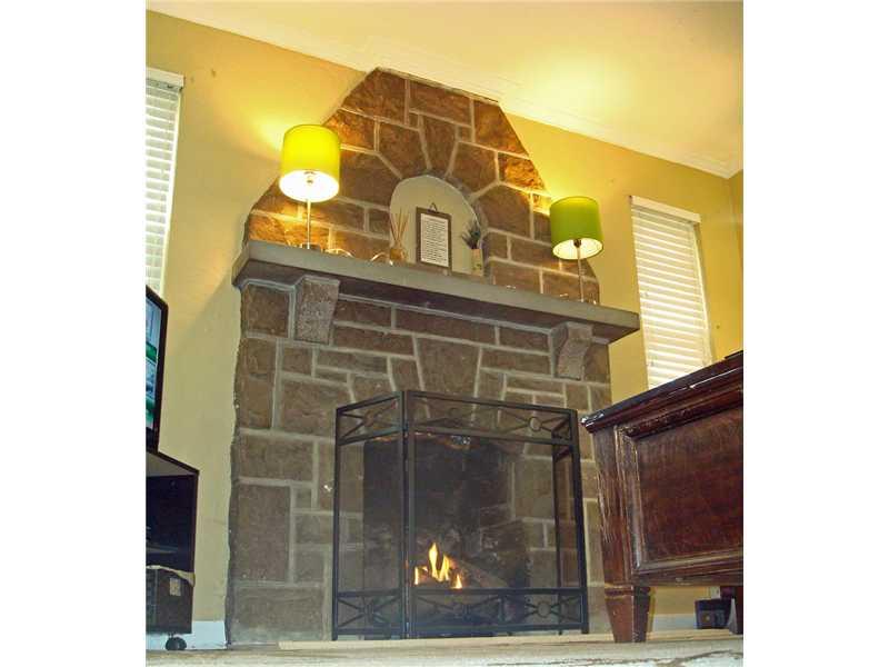 4831 Doyle Road Whitehall, PA 15227 - Photo 6 of 25 Living Room. Beautiful Floor to Ceiling Stone Gas Log Fireplace