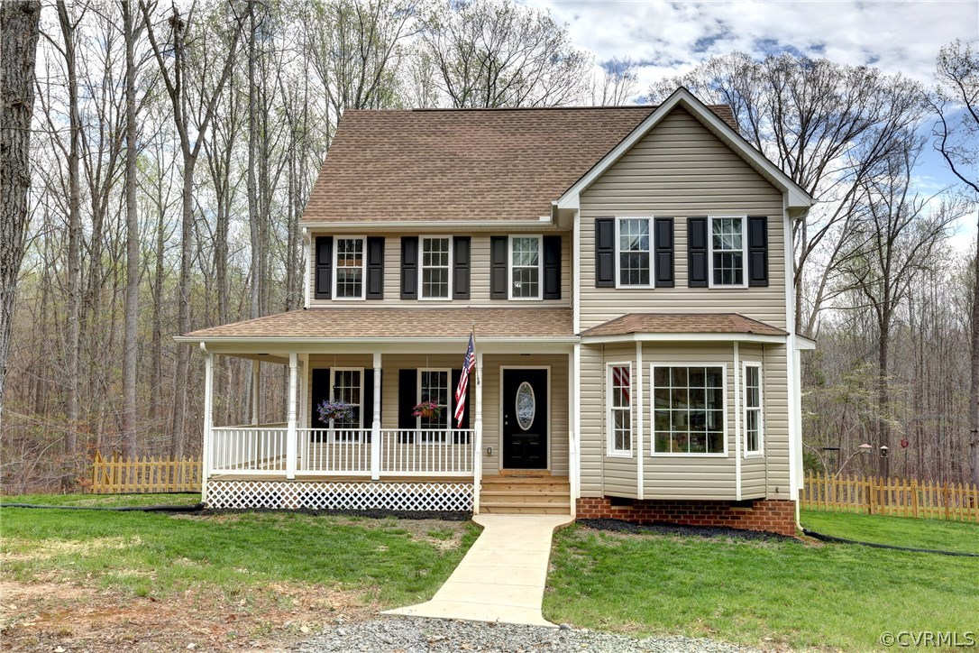 4947 Shannon Road Kents Store, VA 23084 - Photo 1 of 24 a front view of a house with a yard