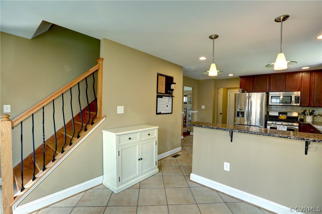 4947 Shannon Road Kents Store, VA 23084 - Photo 11 of 24 a view of a kitchen with furniture and a window
