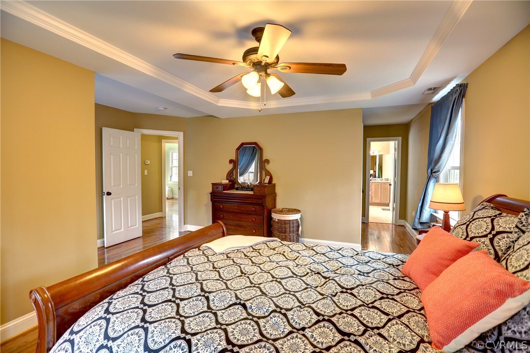 4947 Shannon Road Kents Store, VA 23084 - Photo 14 of 24 a bedroom with a bed and a chandelier