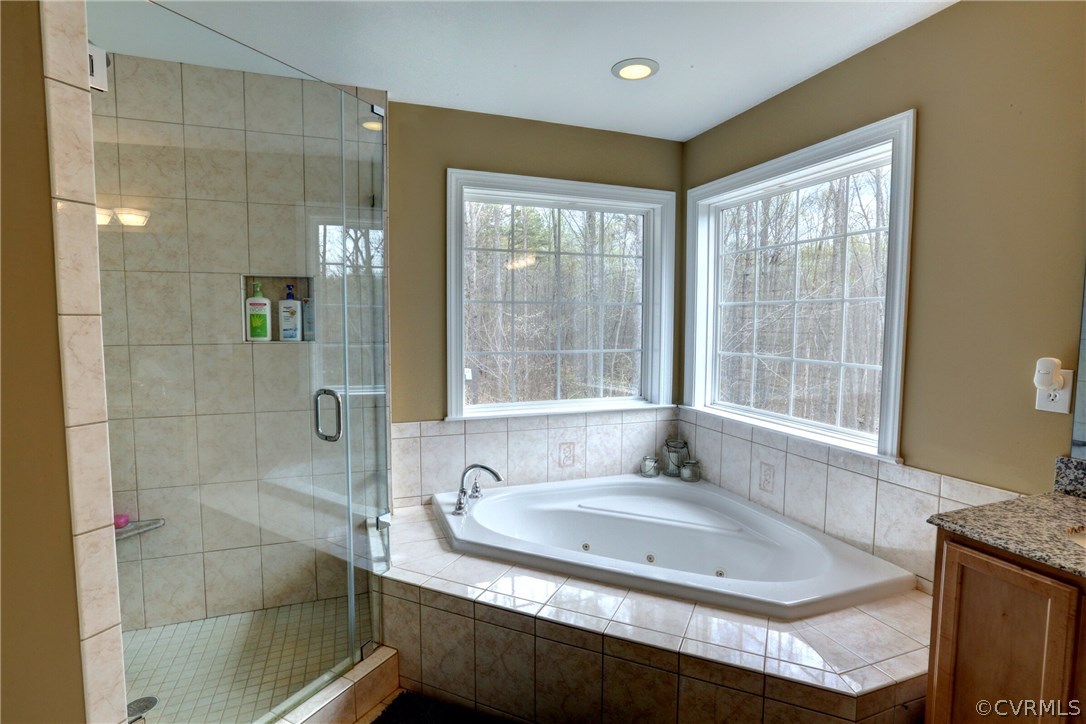 4947 Shannon Road Kents Store, VA 23084 - Photo 15 of 24 a bathroom with a granite countertop sink and large mirror