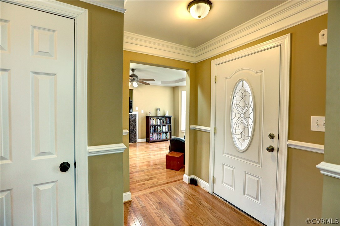4947 Shannon Road Kents Store, VA 23084 - Photo 2 of 24 a view of a hallway with wooden floor windows and entryway