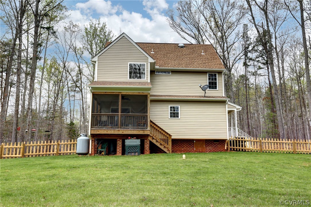 4947 Shannon Road Kents Store, VA 23084 - Photo 21 of 24 a front view of a house with a garden