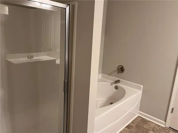 a bathroom with a bathtub