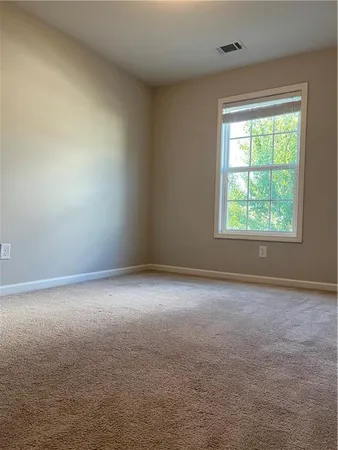 an empty room with a window