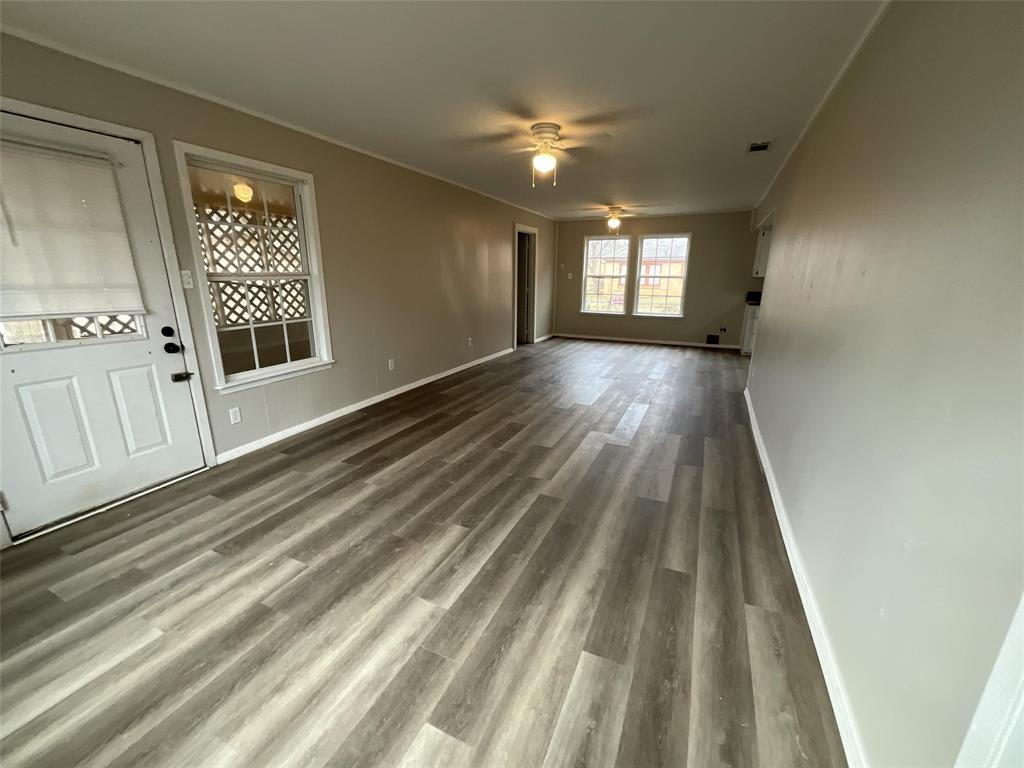 405 Beard Street Canton, TX 75103 - Photo 11 of 20 a view of entryway and hall with wooden floor