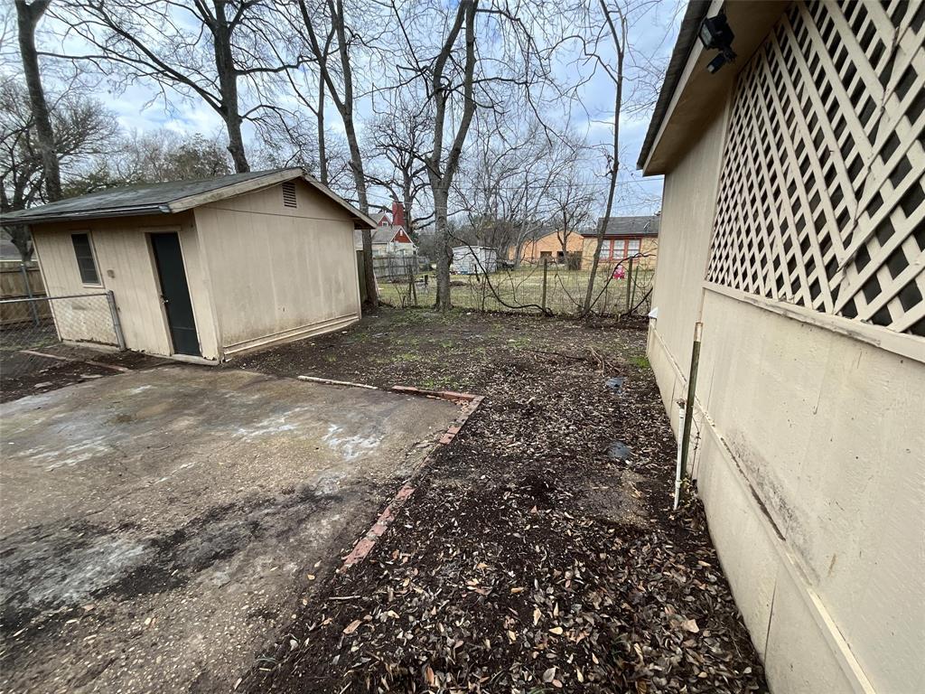 405 Beard Street Canton, TX 75103 - Photo 19 of 20 a view of a house with a yard