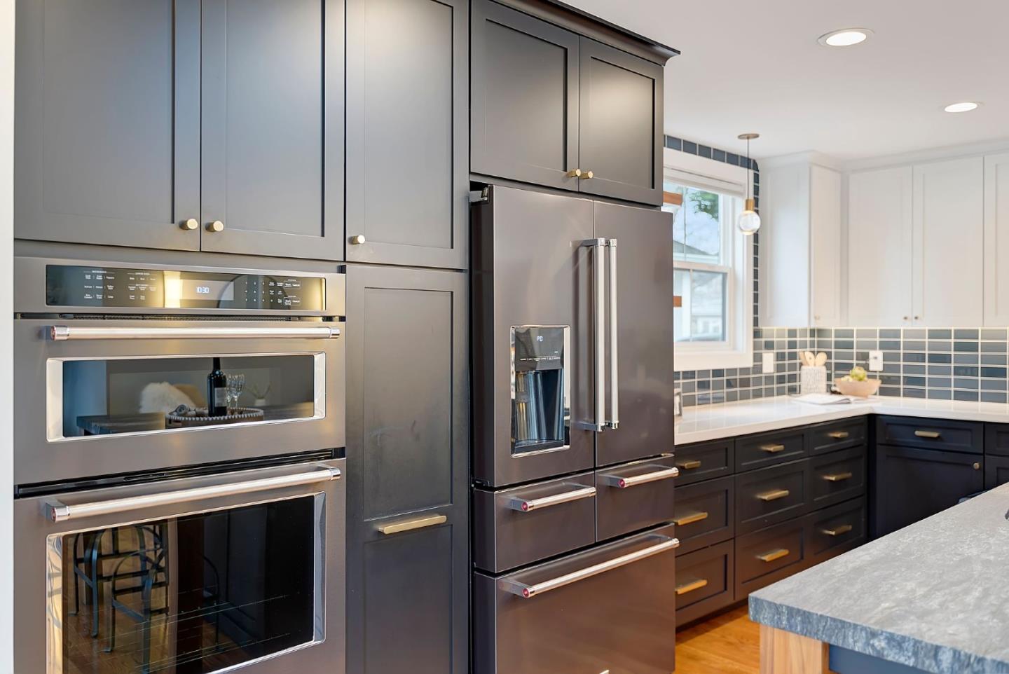 971 Pine Avenue San Jose, CA 95125 - Photo 14 of 36 a kitchen with stainless steel appliances granite countertop a refrigerator a stove and a sink