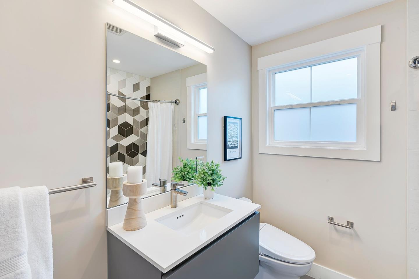 971 Pine Avenue San Jose, CA 95125 - Photo 25 of 36 a bathroom with a sink a toilet and shower