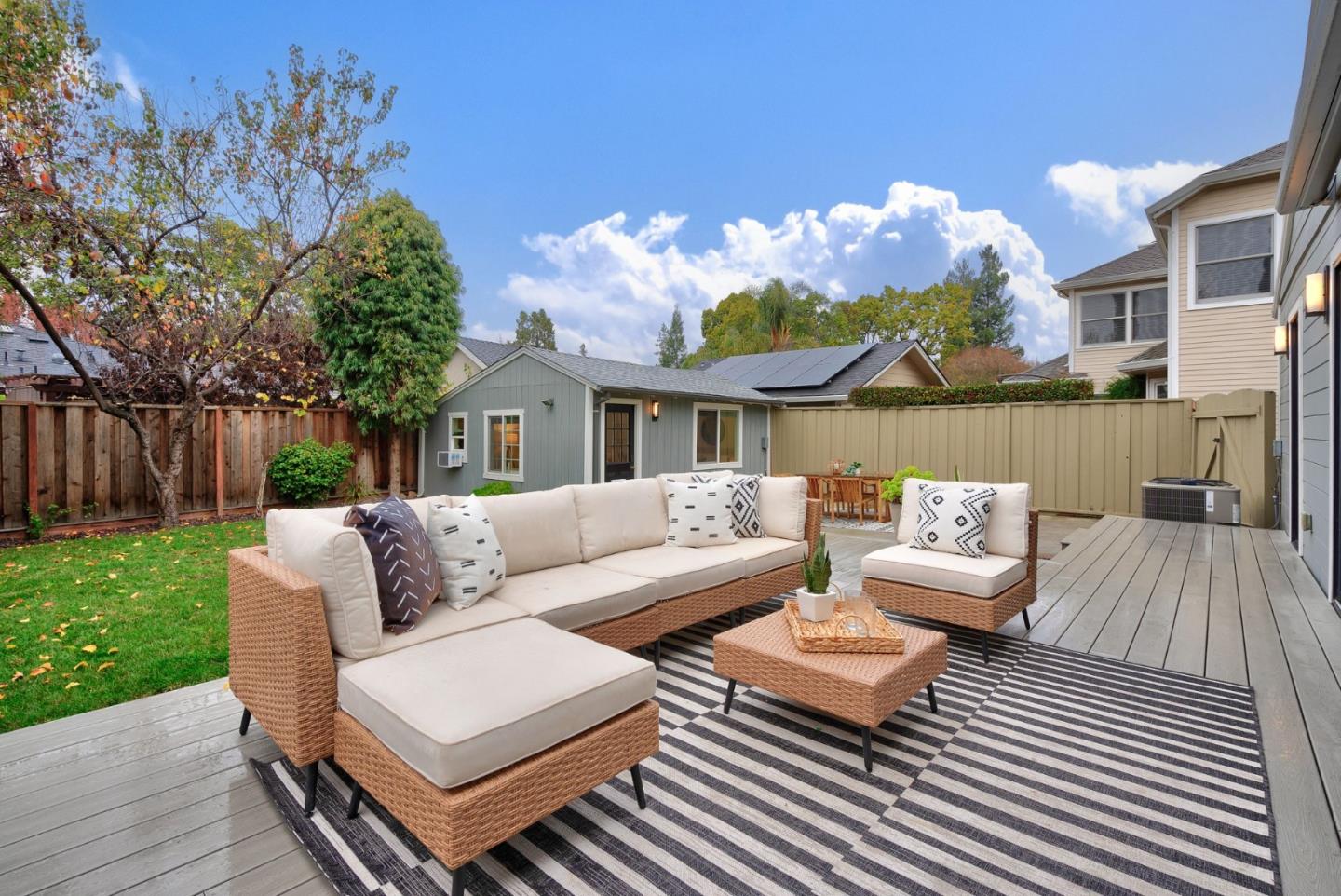 971 Pine Avenue San Jose, CA 95125 - Photo 27 of 36 a balcony with hardwood table and chairs