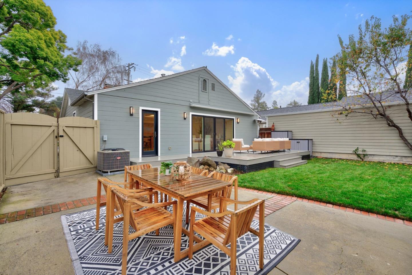 971 Pine Avenue San Jose, CA 95125 - Photo 34 of 36 a backyard of a house with table and chairs