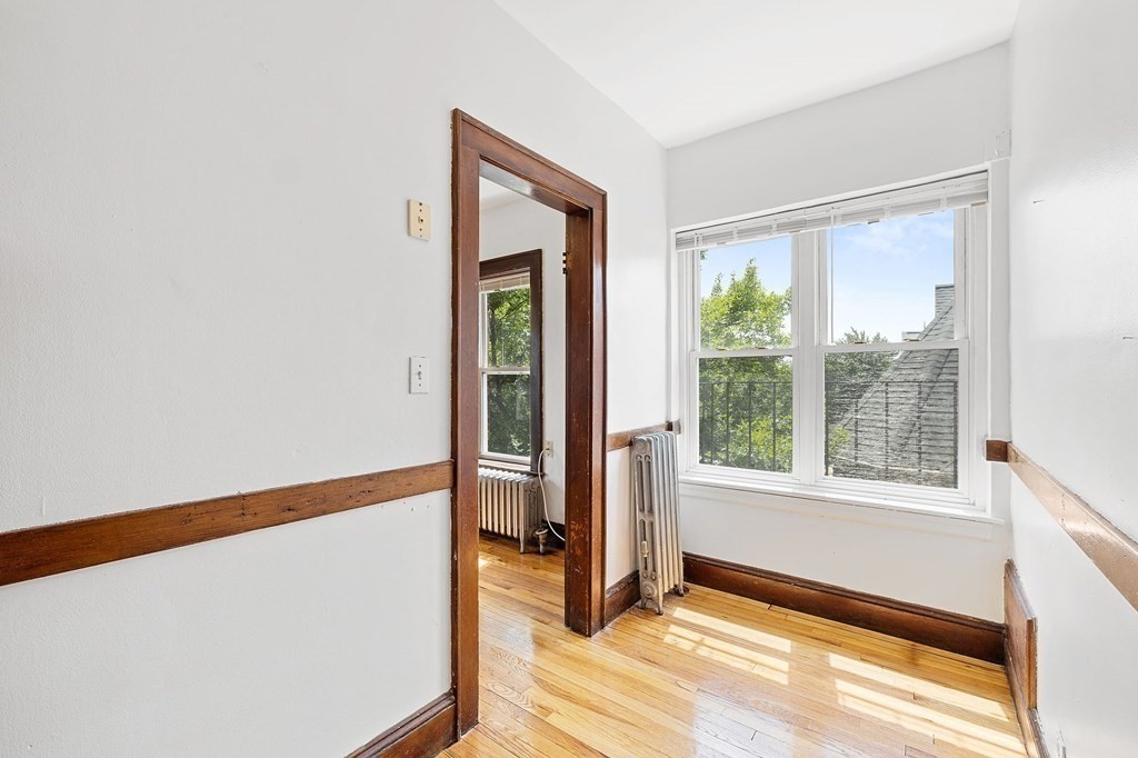 5 Haskell Street, Unit 31 Cambridge, MA 02140 - Photo 4 of 9 a view of an empty room with a window