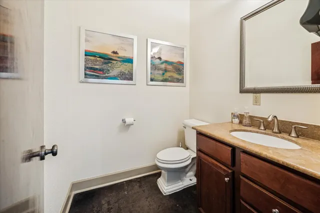 a bathroom with a sink and mirror