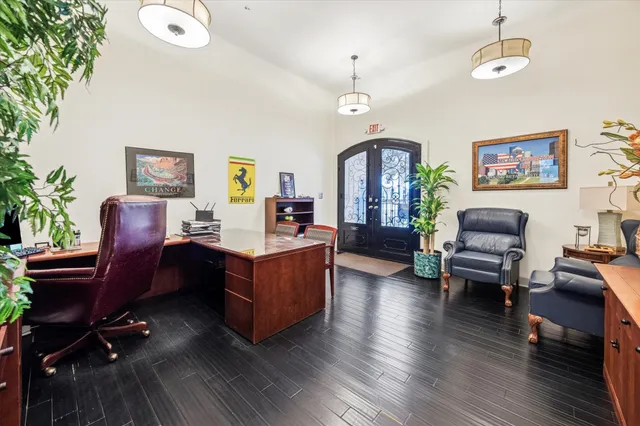 a view of a livingroom with furniture and a potted plant