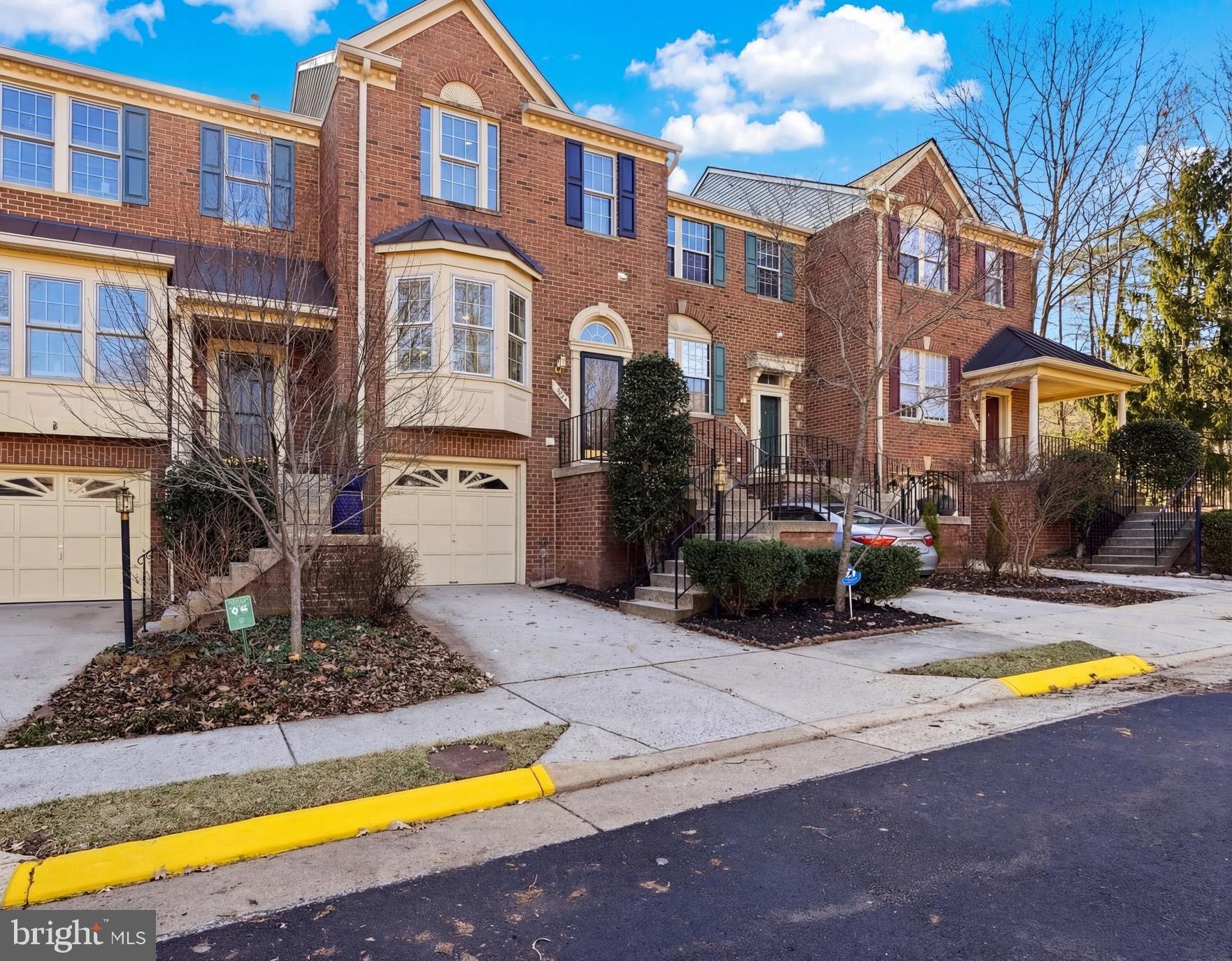 a front view of a house with swimming pool