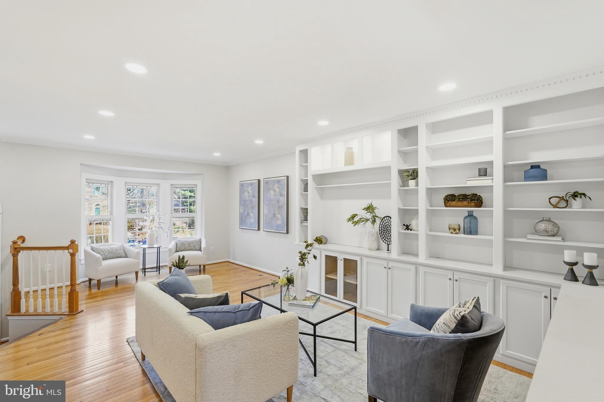 1472 Park Garden Lane Reston, VA 20194 - Photo 12 of 64 a living room with furniture a rug and a table