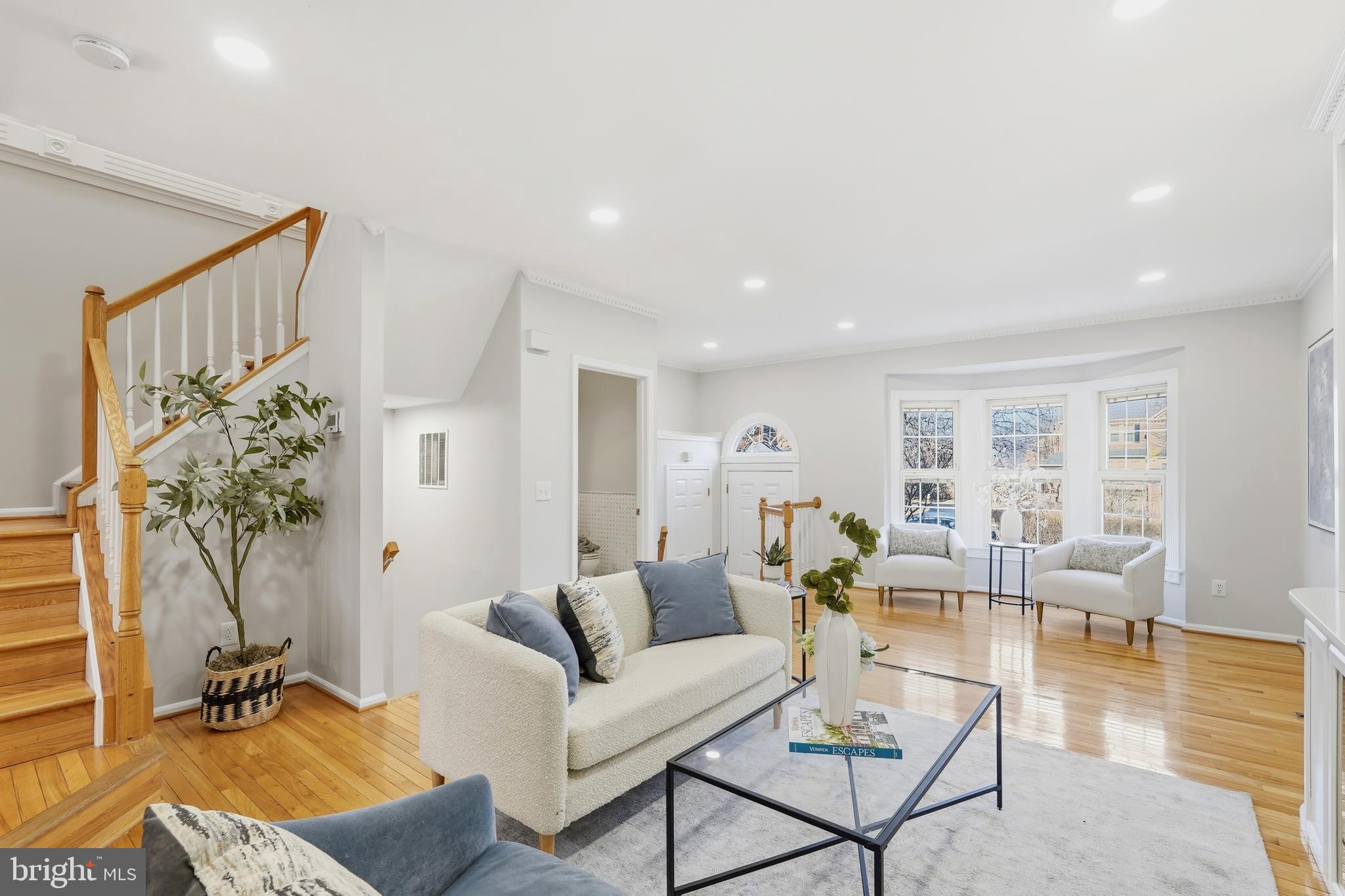 1472 Park Garden Lane Reston, VA 20194 - Photo 2 of 64 a living room with furniture and a large window