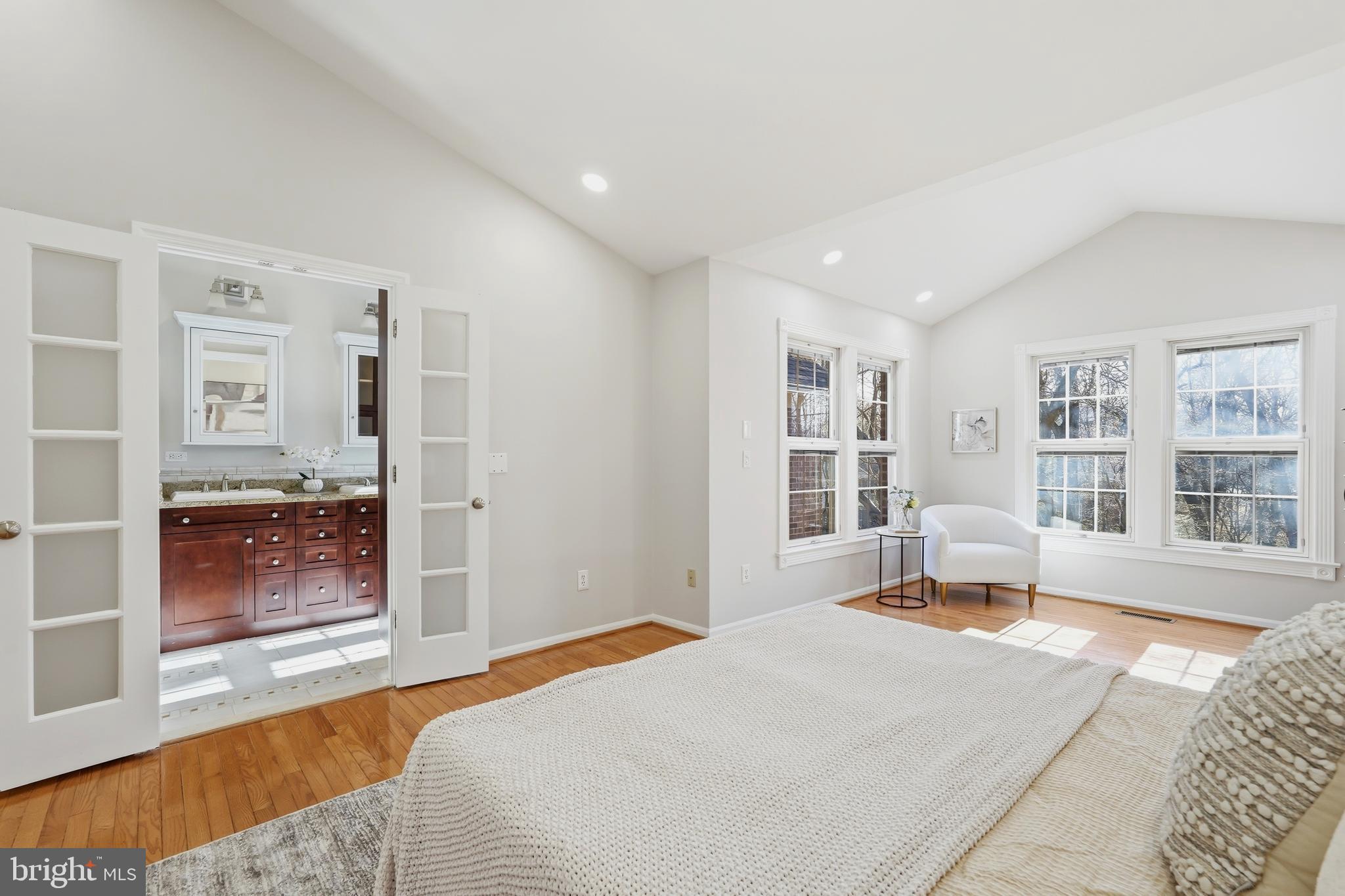 1472 Park Garden Lane Reston, VA 20194 - Photo 27 of 64 a bedroom with a bed cabinets and a window