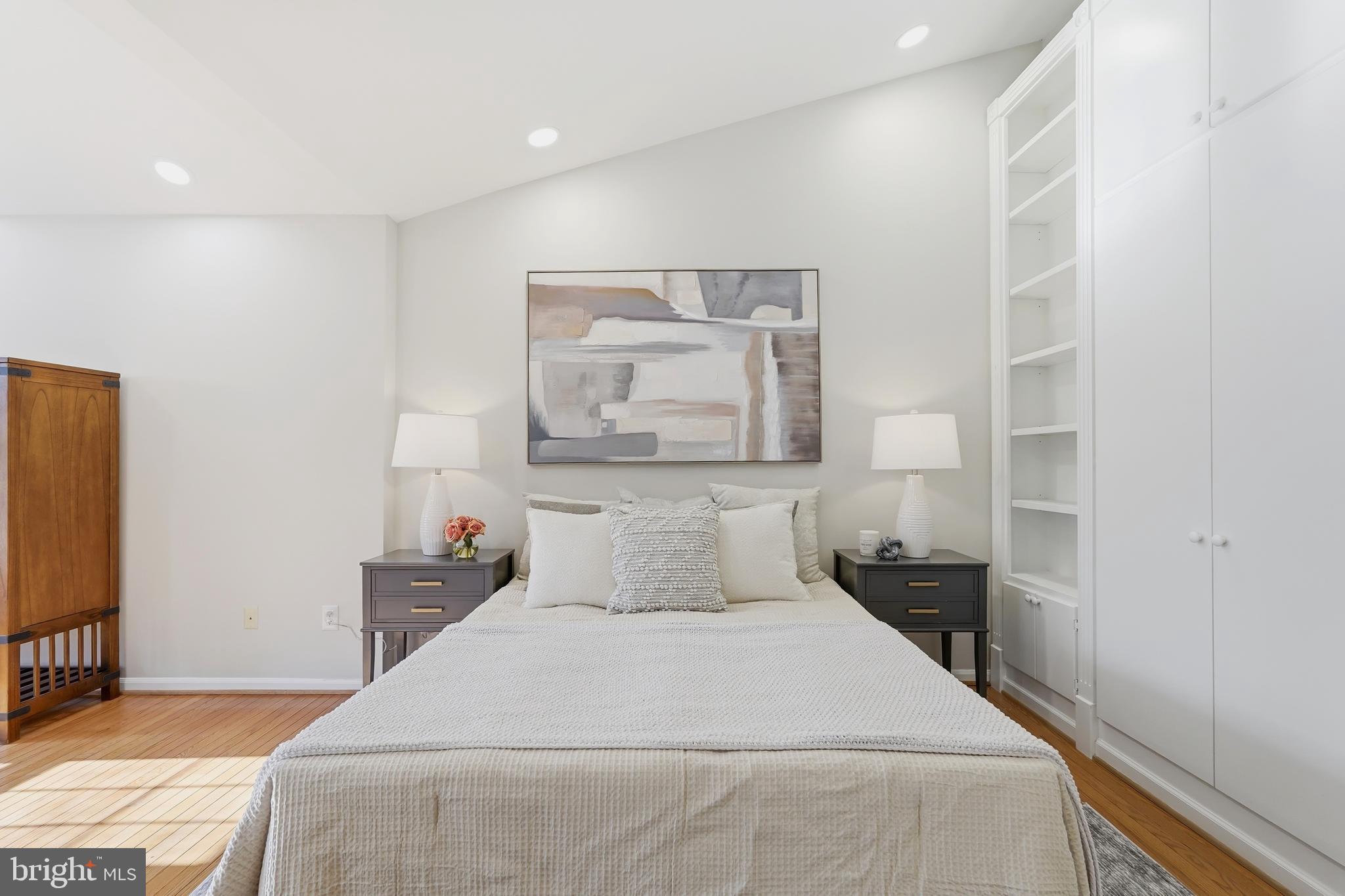 1472 Park Garden Lane Reston, VA 20194 - Photo 32 of 64 a bedroom with a bed and a flat screen tv