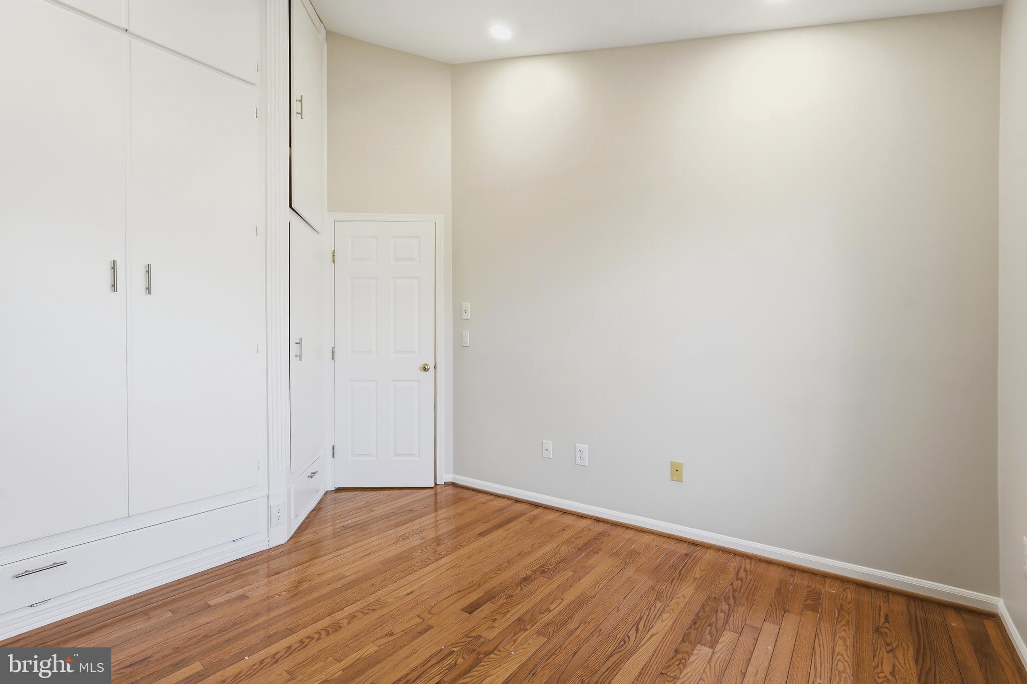 1472 Park Garden Lane Reston, VA 20194 - Photo 40 of 64 a view of a room with wooden floor