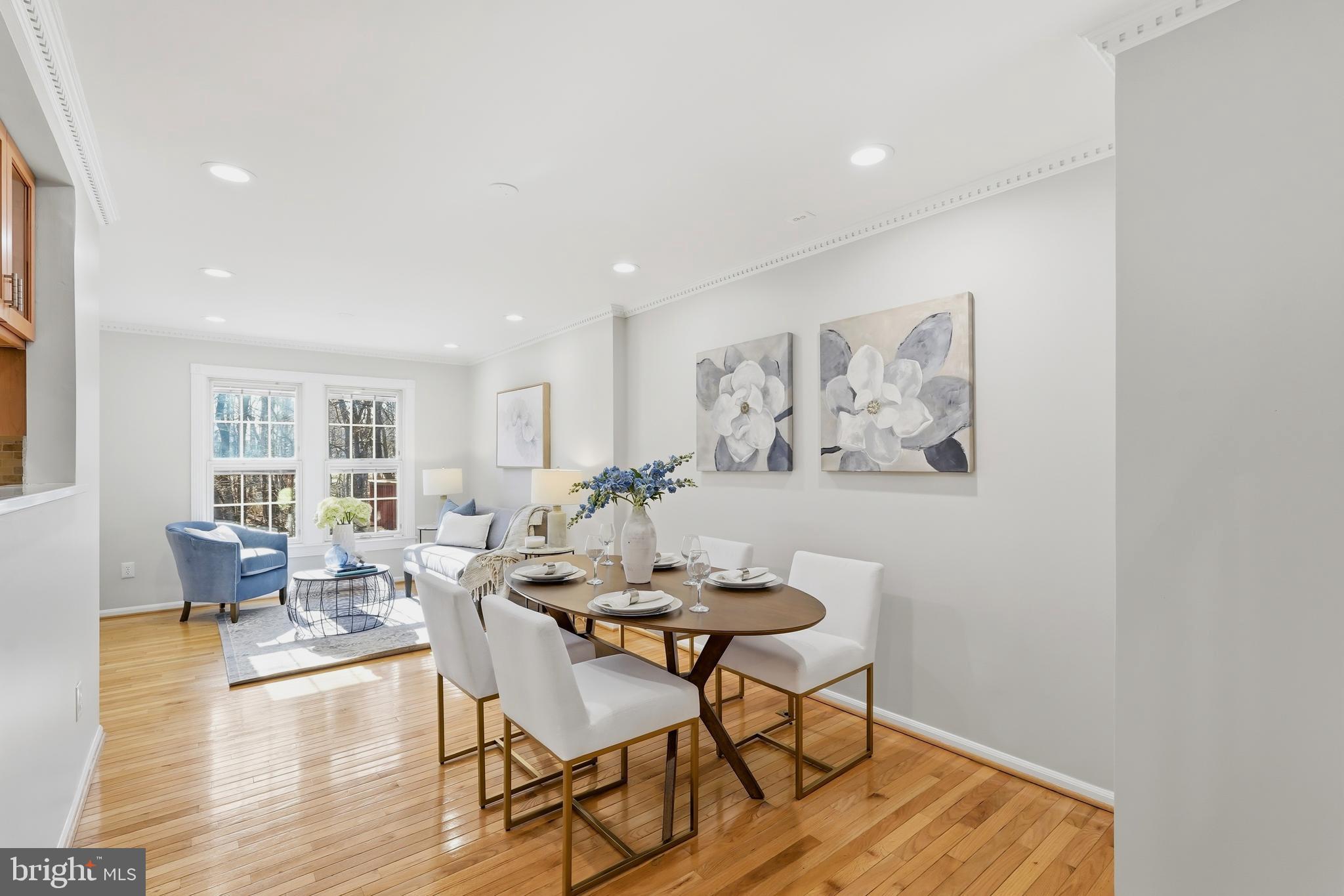 1472 Park Garden Lane Reston, VA 20194 - Photo 5 of 64 a view of a dining room with furniture and wooden floor