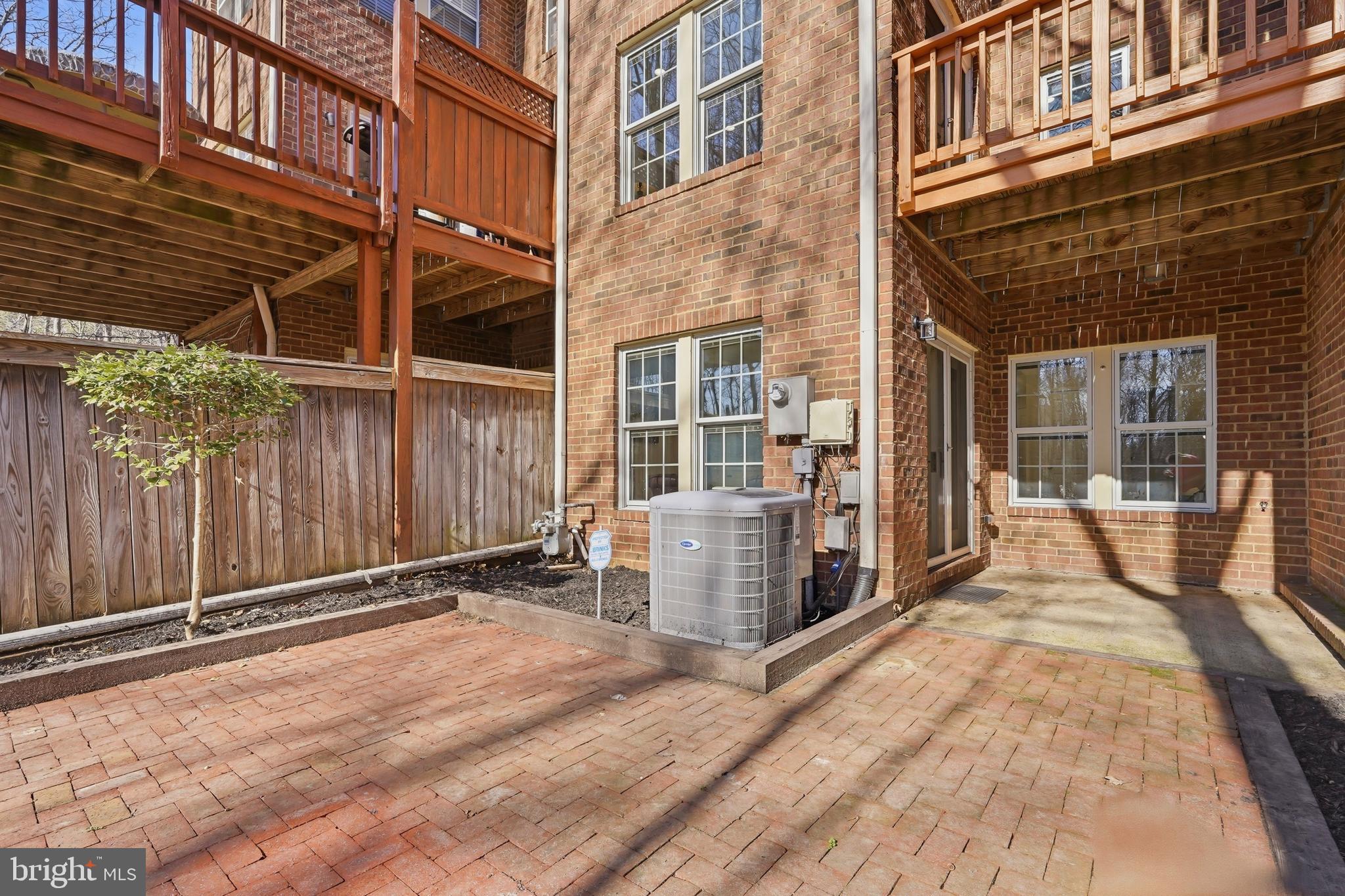 1472 Park Garden Lane Reston, VA 20194 - Photo 60 of 64 a view of a brick building with many windows