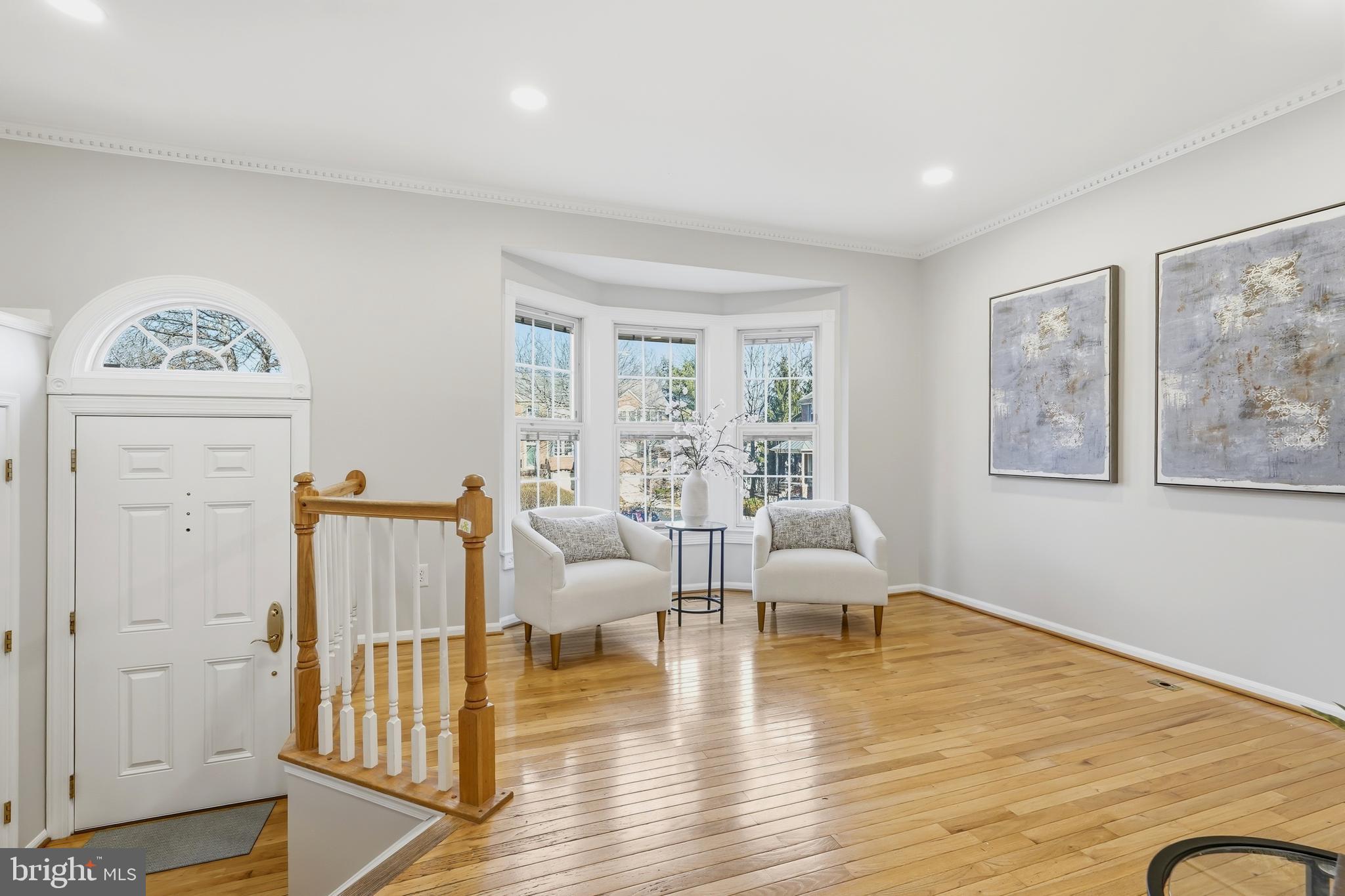 1472 Park Garden Lane Reston, VA 20194 - Photo 6 of 64 a living room with furniture and wooden floor