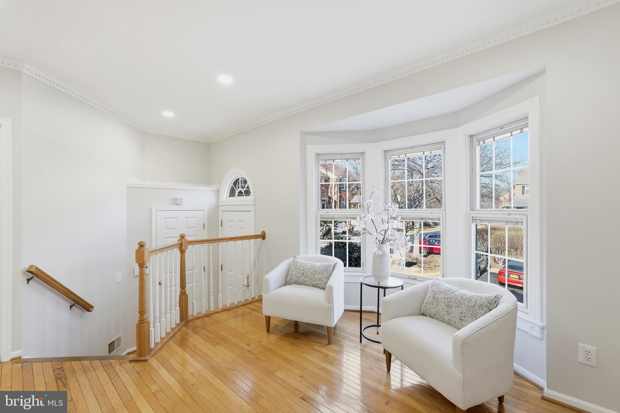1472 Park Garden Lane Reston, VA 20194 - Photo 7 of 64 a living room with furniture and a wooden floor