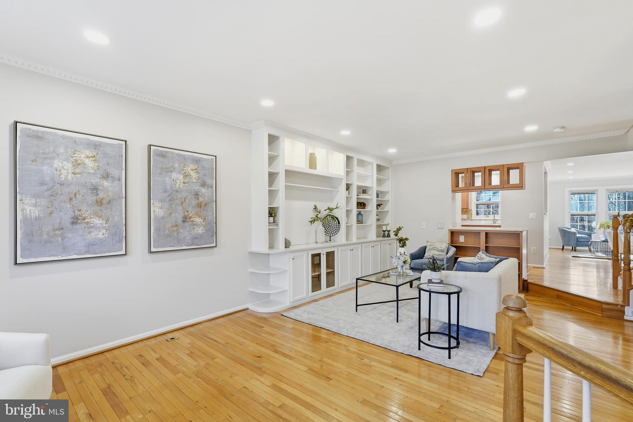 1472 Park Garden Lane Reston, VA 20194 - Photo 8 of 64 a living room with furniture and paintings on the wall