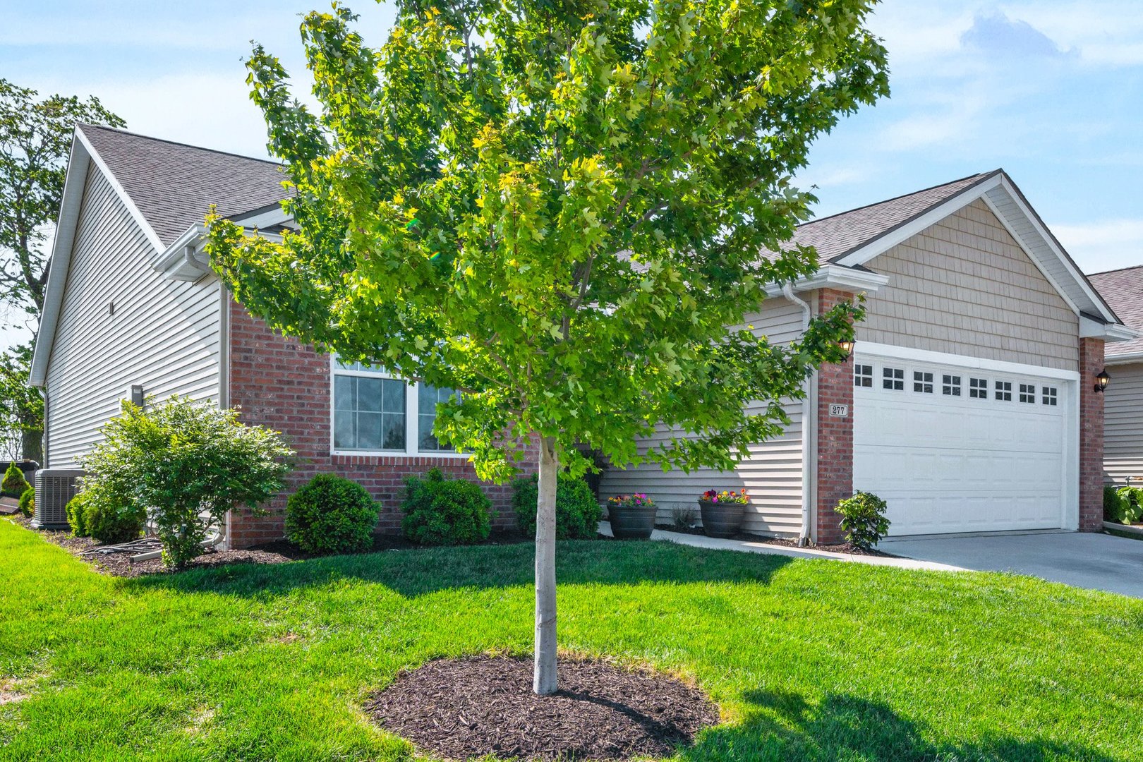 277 Cassidy Road Normal, IL 61761 - Photo 31 of 42 a view of a house with a backyard