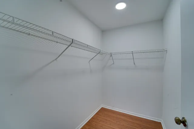 a view of a room with racks on the wall