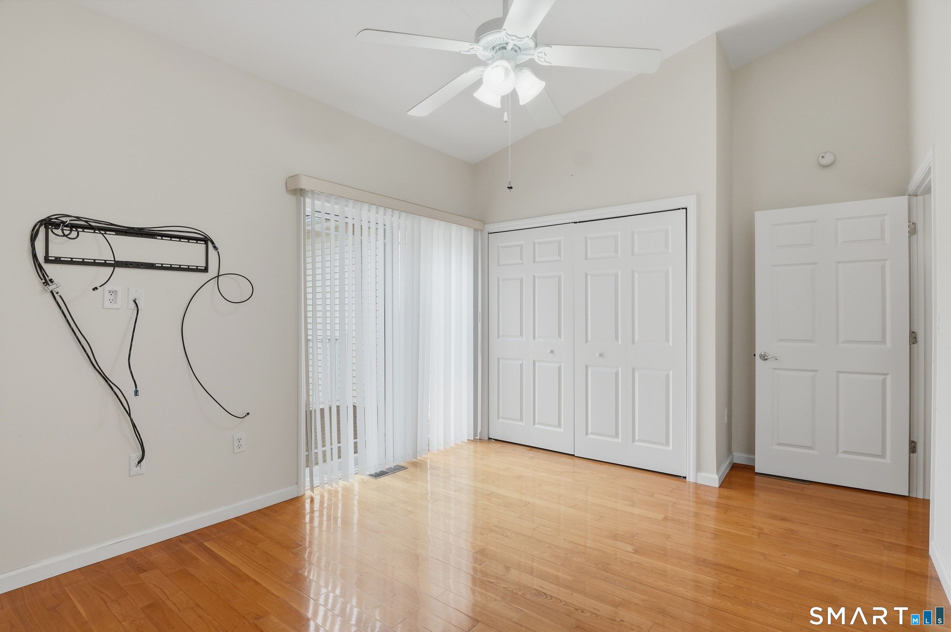 2 Park Avenue, Unit 3 Wolcott, CT 06716 - Photo 11 of 18 a view of a room with wooden floor and ceiling fan