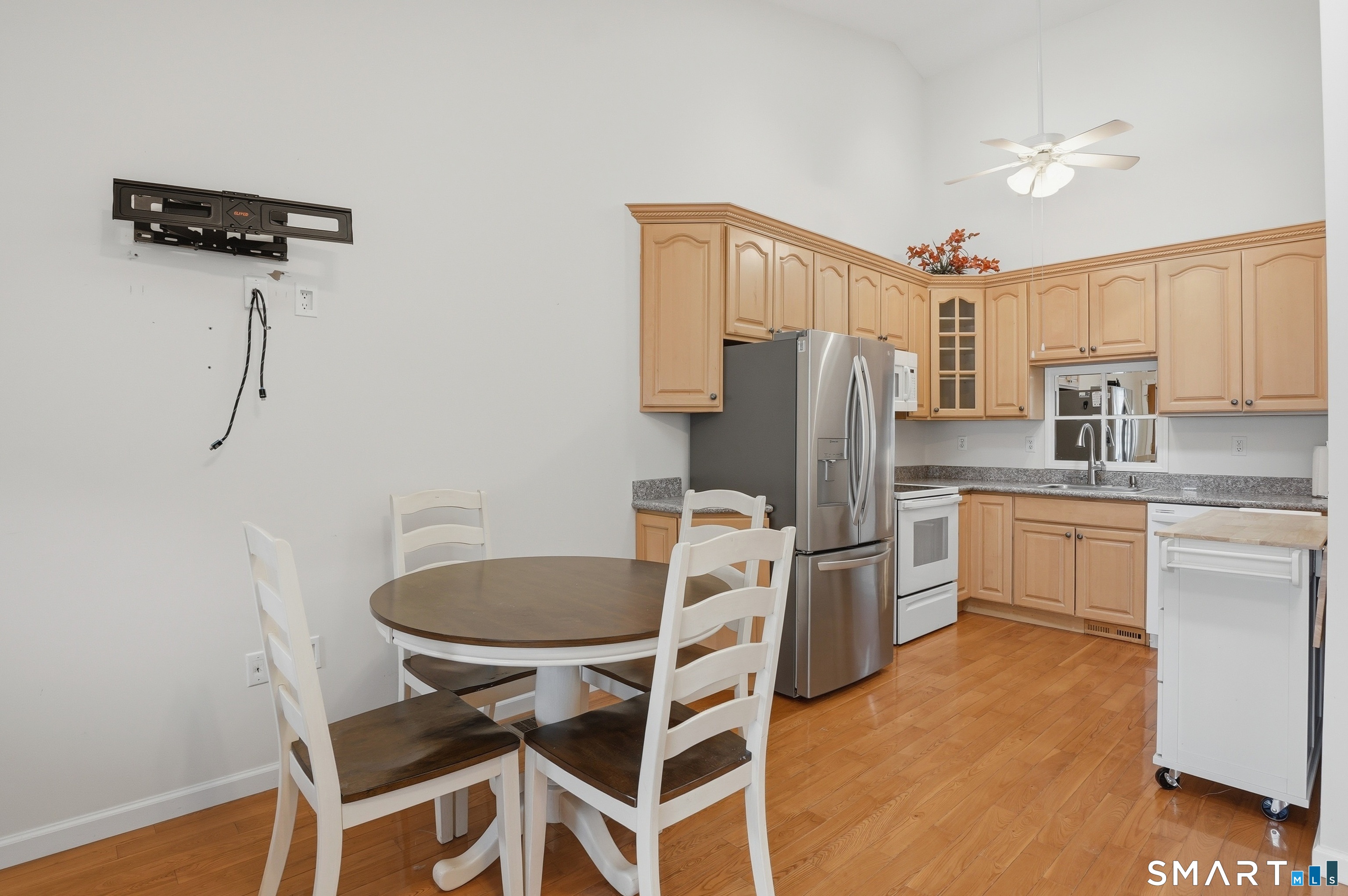 2 Park Avenue, Unit 3 Wolcott, CT 06716 - Photo 9 of 18 a kitchen with white cabinets and stainless steel appliances
