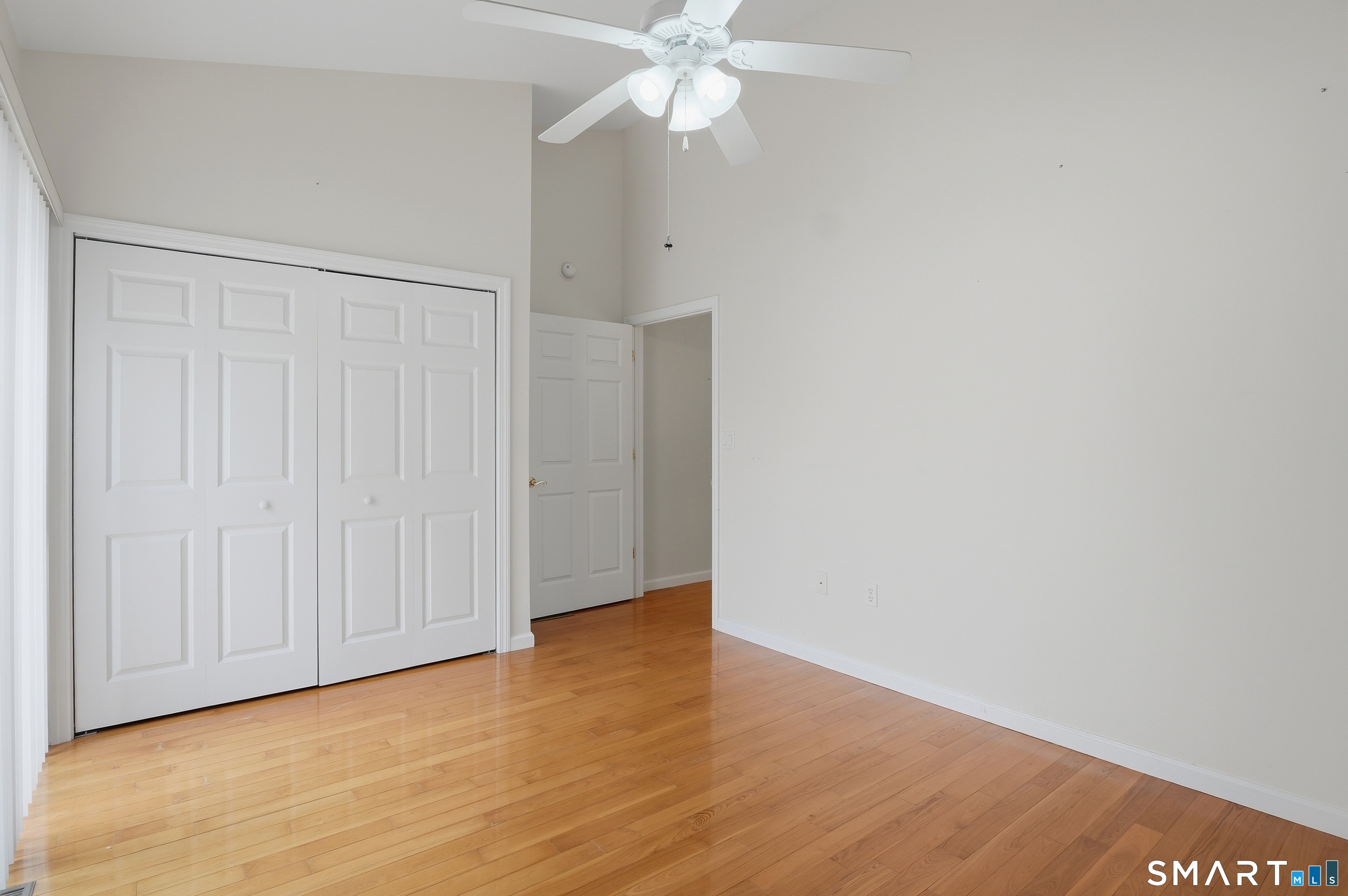 2 Park Avenue, Unit 3 Wolcott, CT 06716 - Photo 10 of 18 a view of an empty room with wooden floor