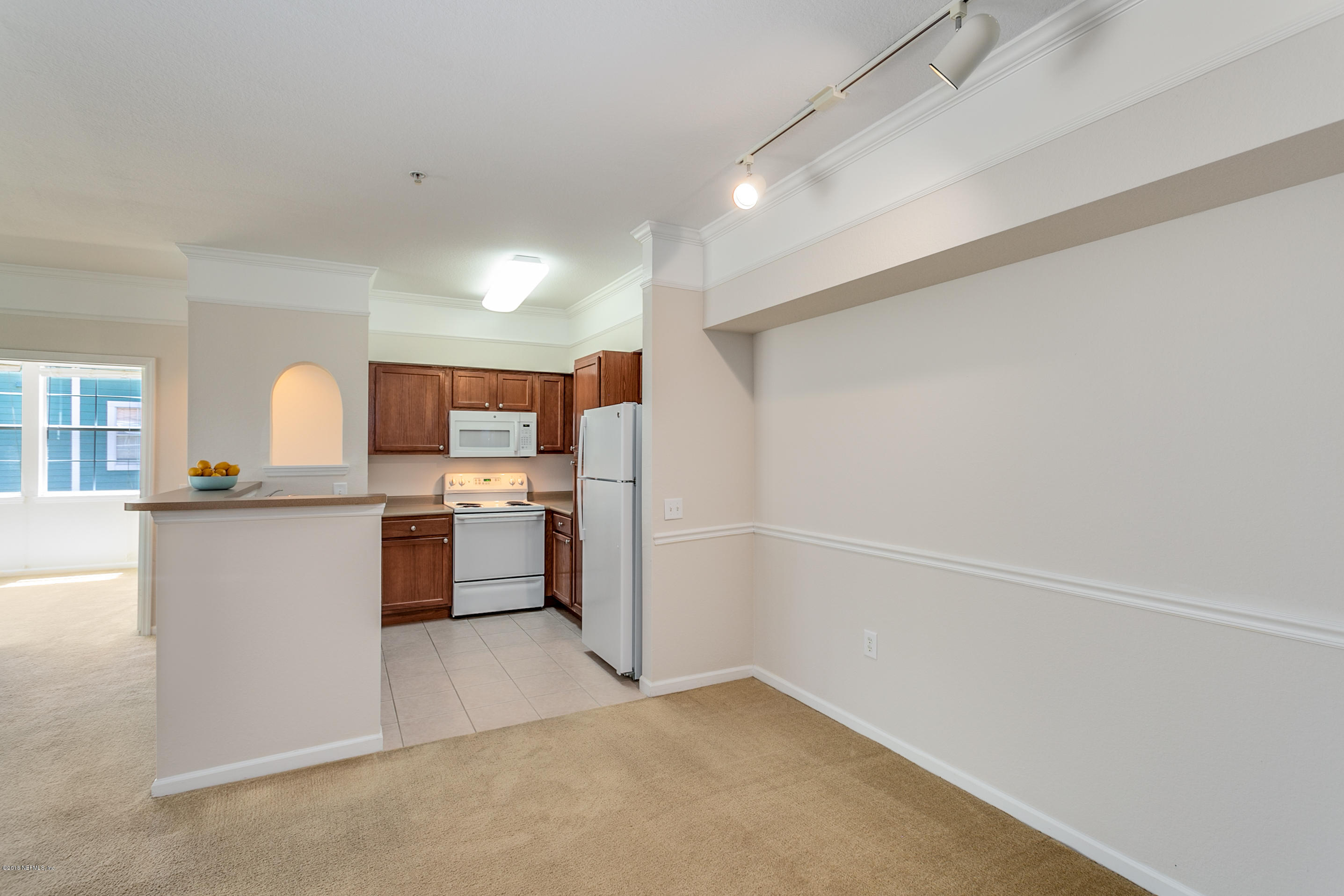 8550 Touchton Road, Unit 1128 Jacksonville, FL 32216 - Photo 5 of 18 Dining and Kitchen Area
