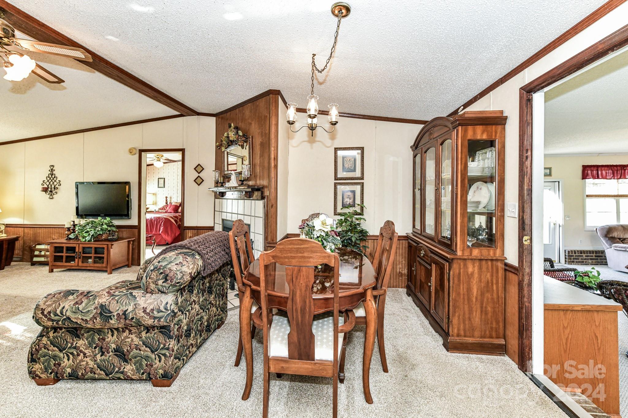 717 Clontz Long Road Monroe, NC 28110 - Photo 16 of 35 a view of a livingroom with furniture window and wooden floor