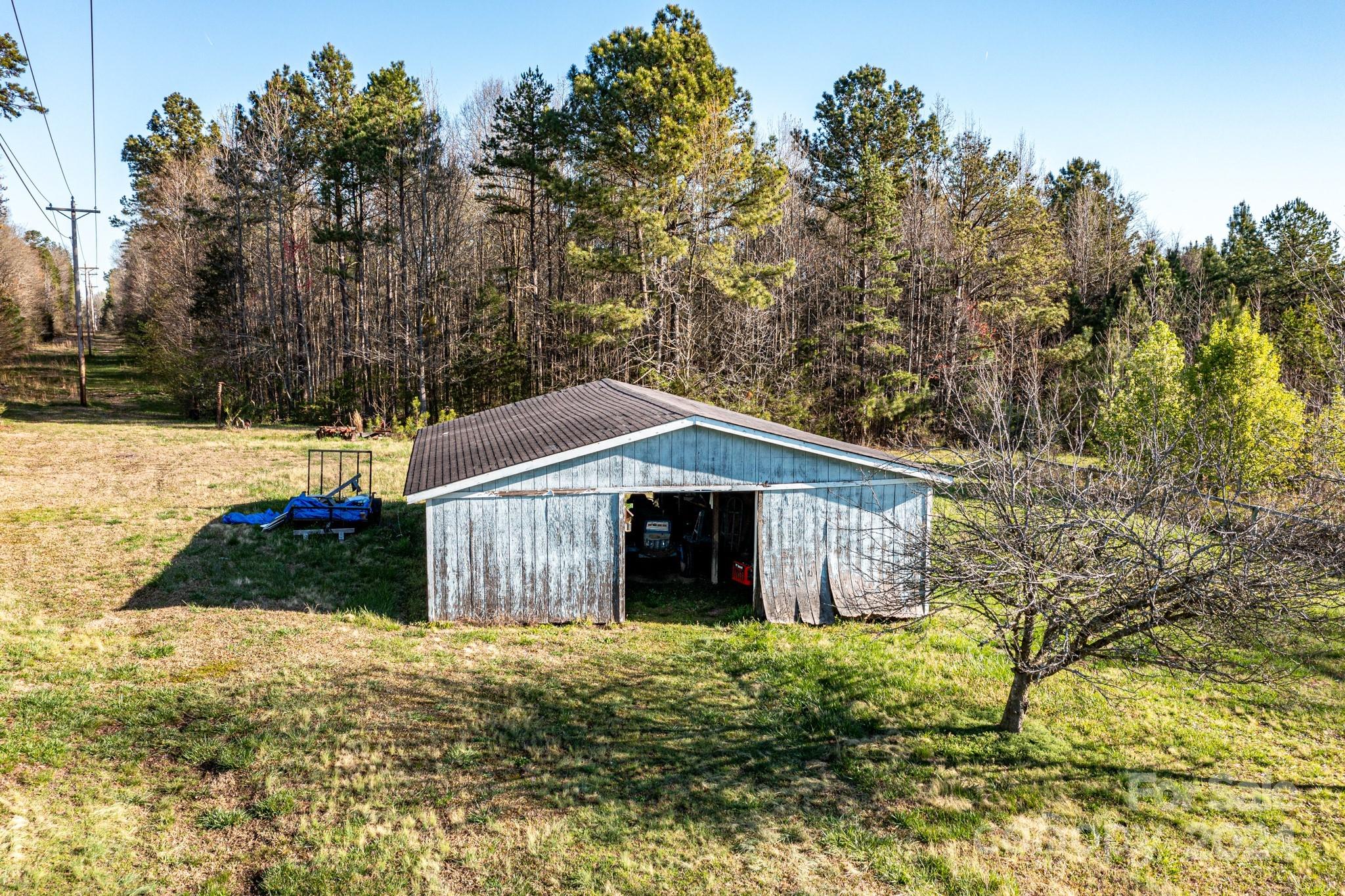717 Clontz Long Road Monroe, NC 28110 - Photo 33 of 35 a front view of a house with garden