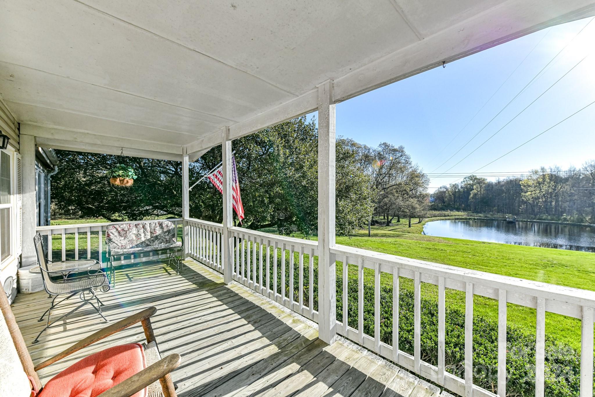 717 Clontz Long Road Monroe, NC 28110 - Photo 5 of 35 a view of balcony with wooden floor and fence