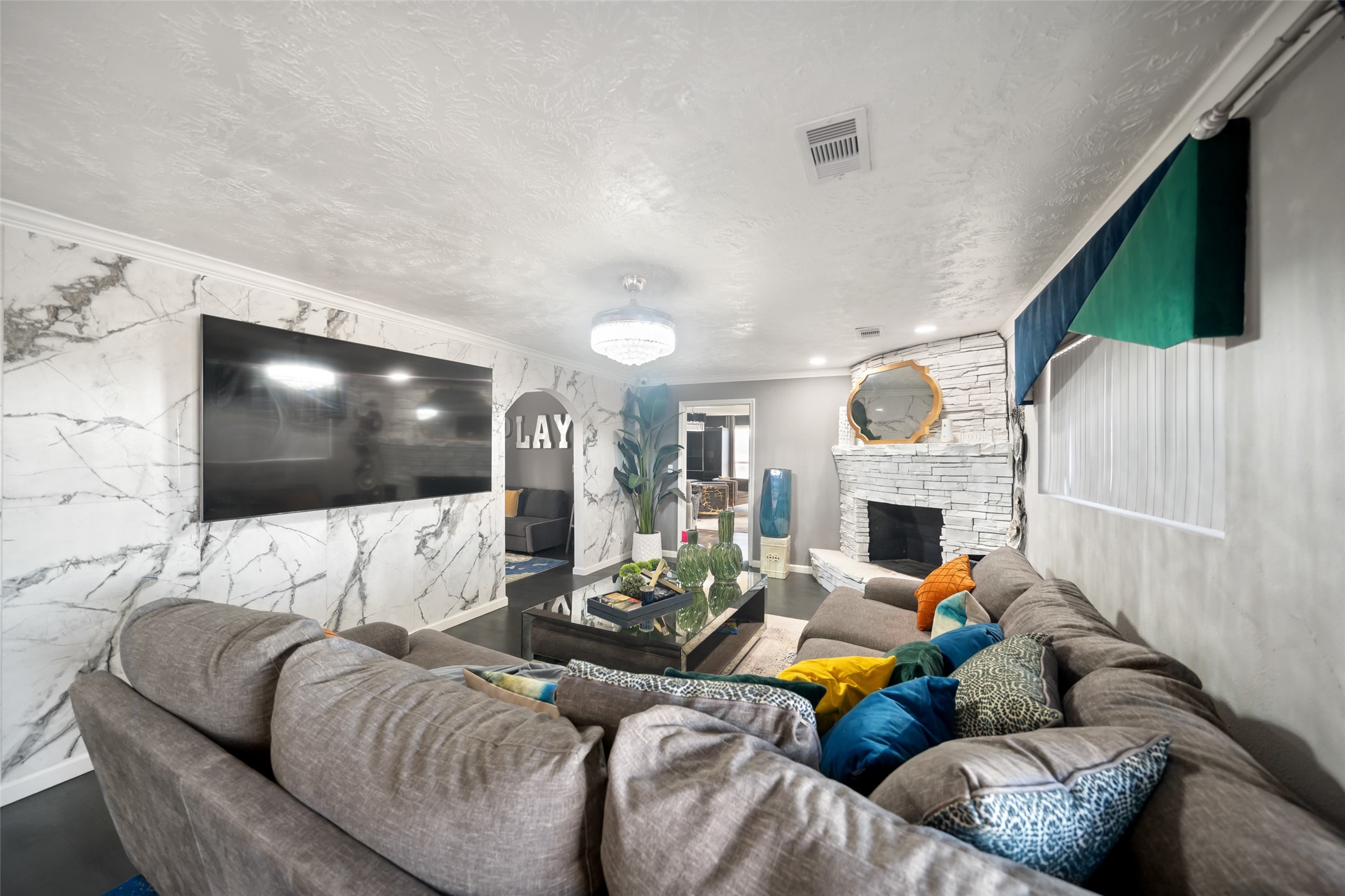 43910 Highway 290 Business Prairie View, TX 77484 - Photo 18 of 49 Open living area with marble-style accent wall.