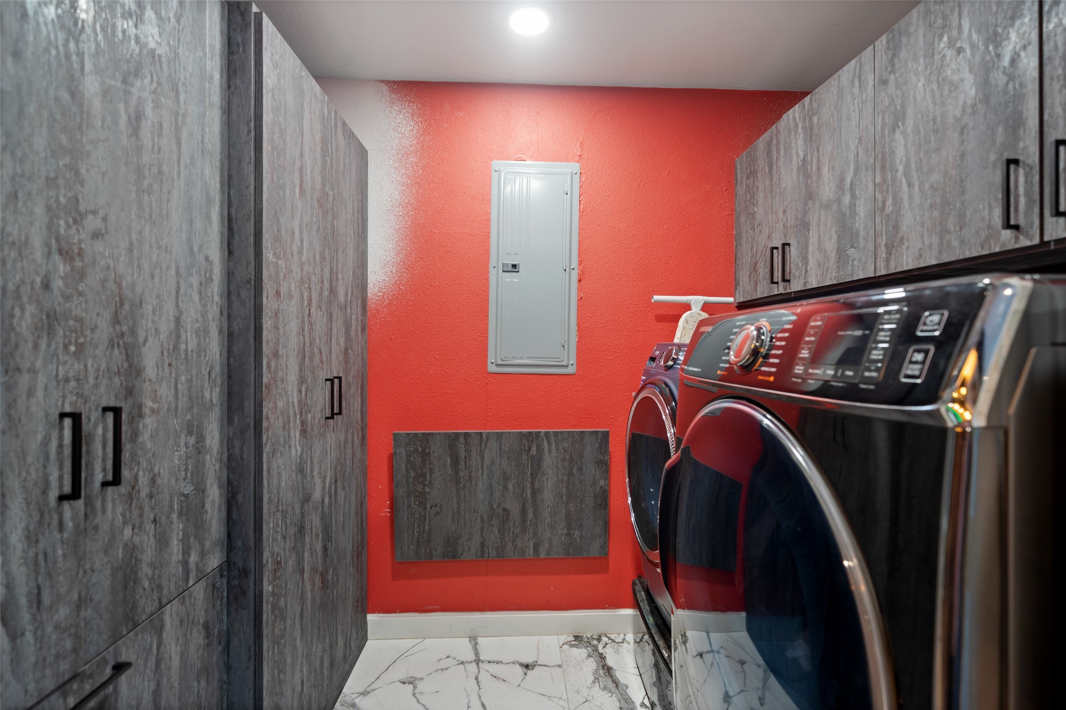 43910 Highway 290 Business Prairie View, TX 77484 - Photo 27 of 49 Dedicated laundry room with cabinetry, modern flooring, and full-size washer and dryer space.